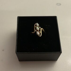 Solid gold and opal ring
